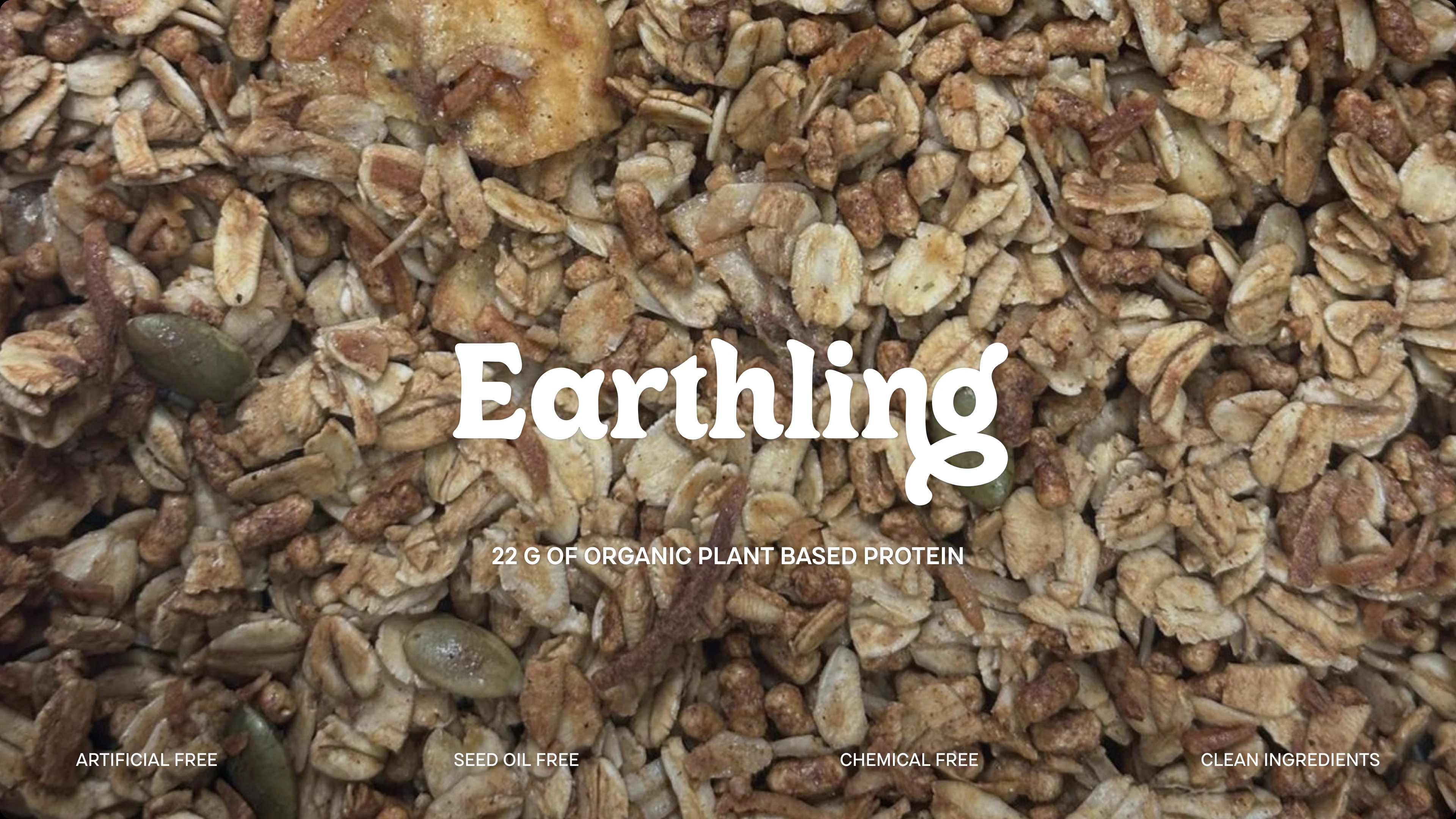 Granola texture with the Earthling wordmark, a 22 g organic plant based protein line, and the brand claims: artificial free, seed oil free, chemical free, clean ingredients