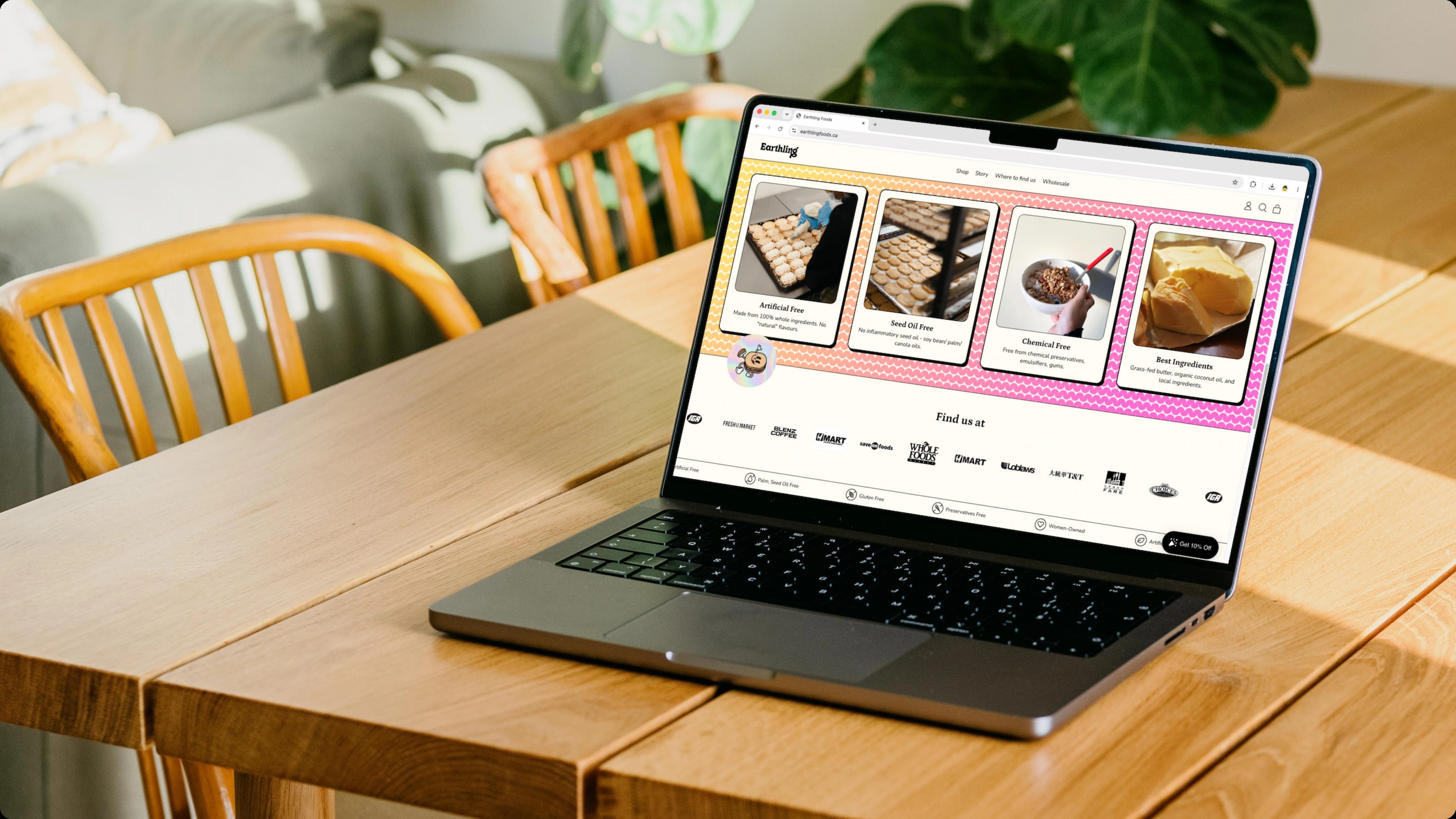 The Earthling Foods website shown on a laptop